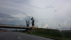 Odyssey  Along I-29/80 at the 24th Street overpass stand four startling sculptures depicting settlement and transformation in this midwestern region.  